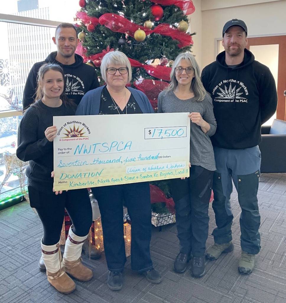 Some of the Union of Northern Workers (UNW) executive members whose regions and locals donated to this year&rsquo;s NWT SPCA Giving Tuesday campaign. From left, UNW Local 11 President Tamara Holliday; North Great Slave RVP Andrew Gregory; UNW President Gayla Thunstrom; NWT SPCA Executive Director Nicole Spencer; and Hay River RVP Jeff Groenewegen. Photo courtesy of the UNW