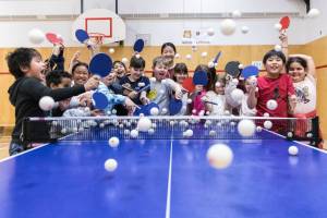 Ivy Liao, back row centre, has been in the territory visiting schools and interacting with students. Her visit is more than just a training exercise, writes columnist Thorsten Gohl. Photo courtesy of Thorsten Gohl